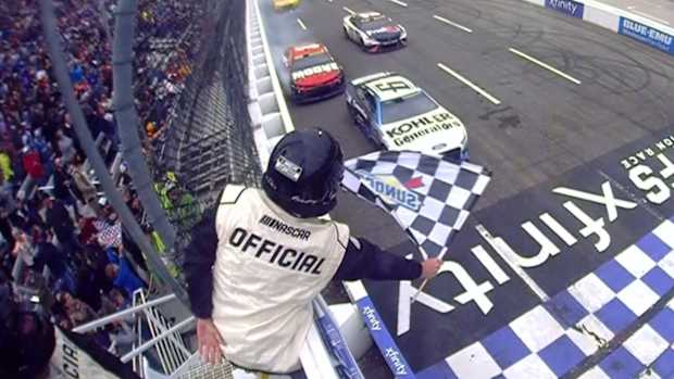 NASCAR race cars at the finish line.
